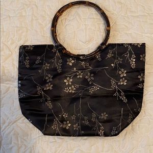 Purse with round bamboo handles